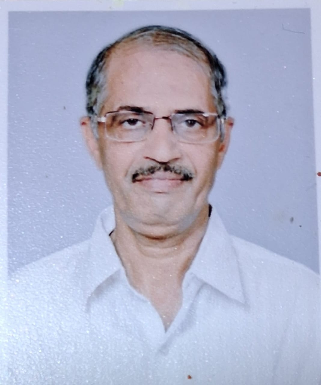 Prof. Madan Tate